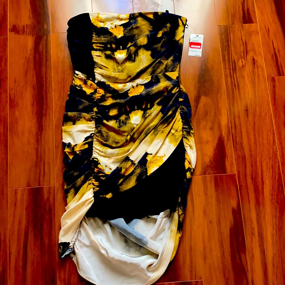 Tube strapless dress.  Hi and low in the back.